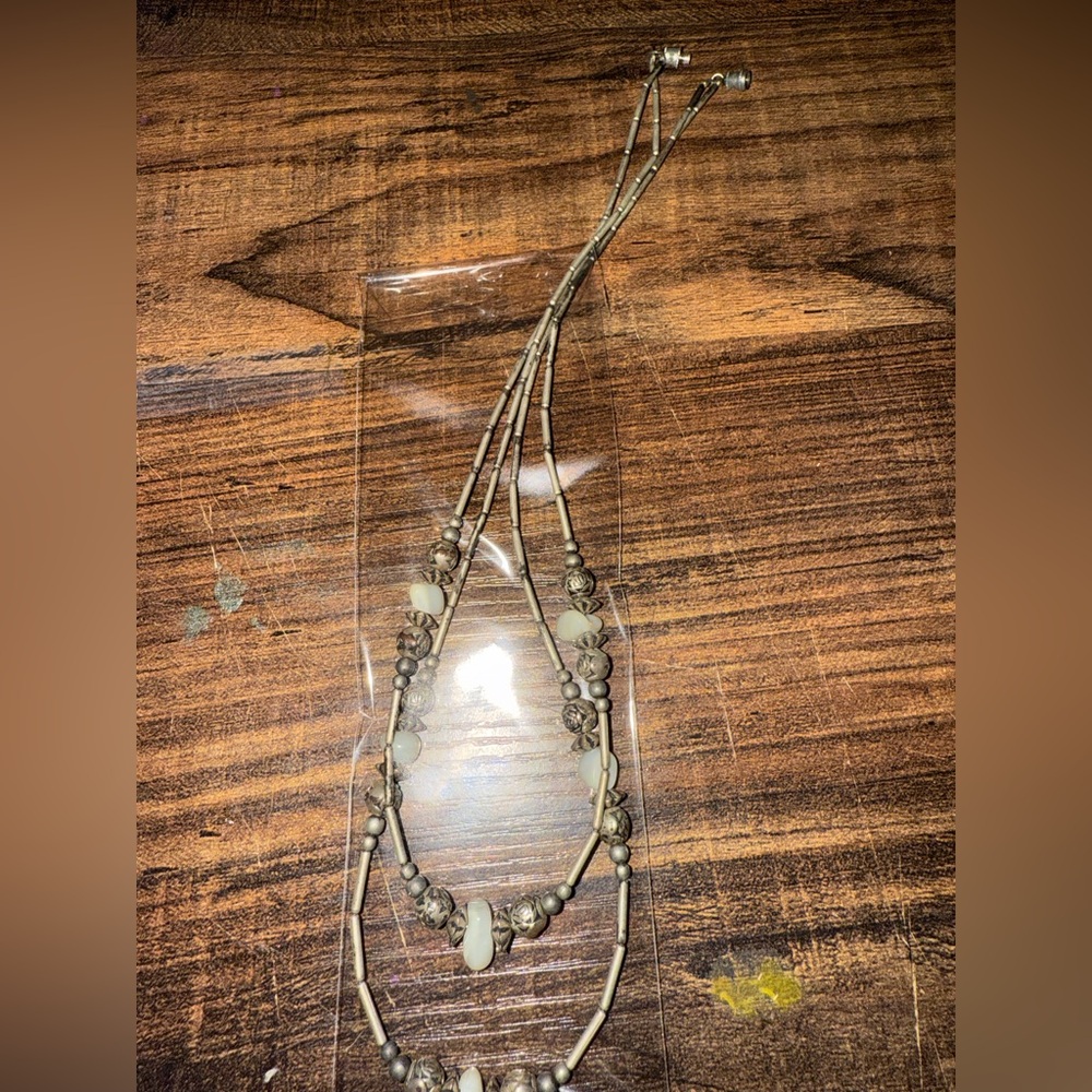 Elegant Silver and Cream Beaded Necklace